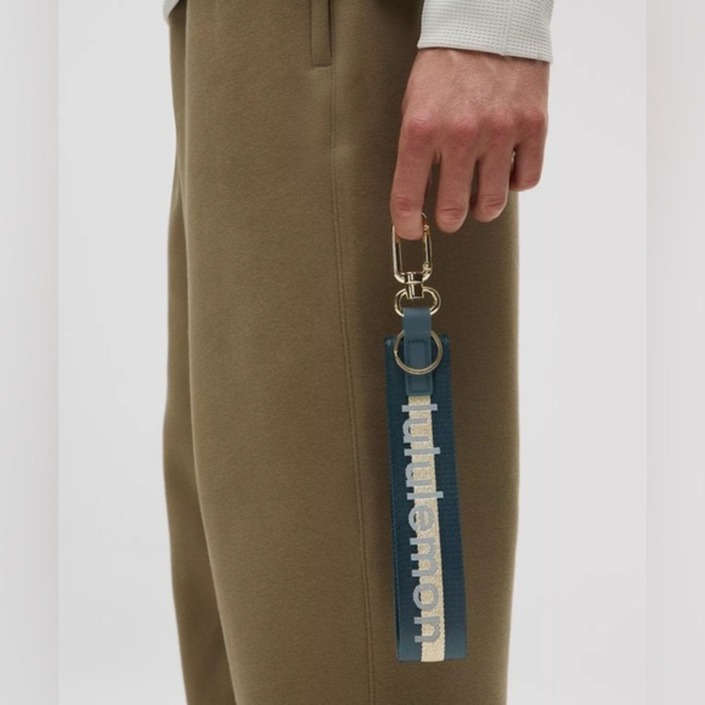 Lululemon NWT! Never Lost Keychain Wordmark - Warp Teal/Gold/Bone
